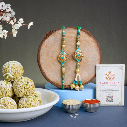 Elegant Kundan Bhaiya Bhabhi Rakhi  N  Sweets Combo